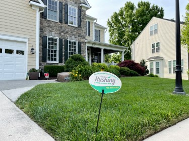 Freshly cut grass on a front lawn.